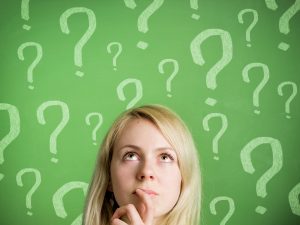 blonde woman is thinking