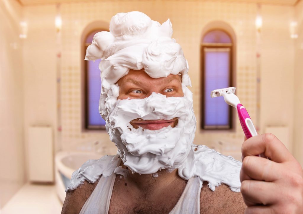 man covered in shaving cream