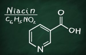 Structural model of Vitamin B3 (Niacine) on the blackboard.